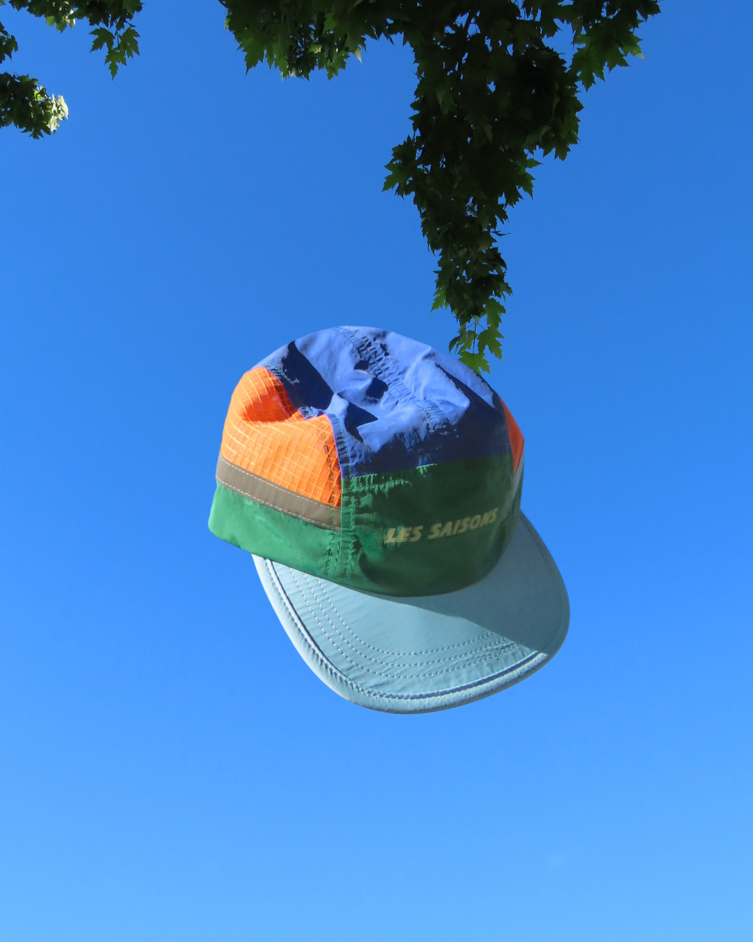 Colorful cap against a clear blue sky