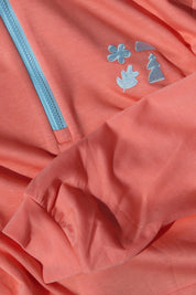 Close-up of a pink jacket with blue Les Saisons design