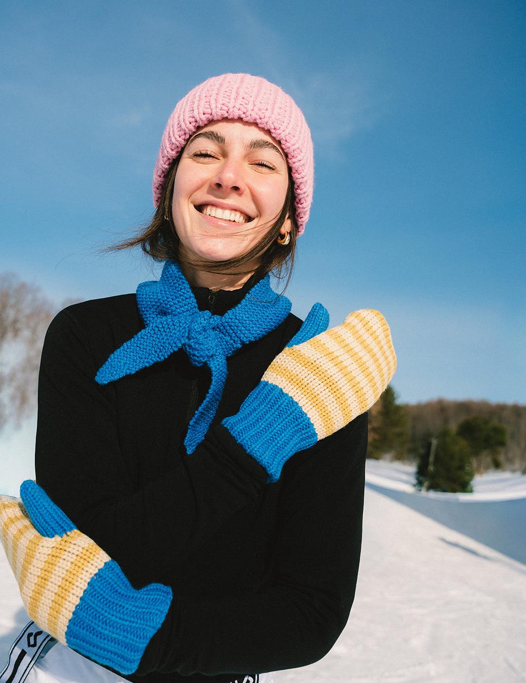 girl wearing Les Saisons merinos mittens and mini scarf_outside_winter_snow_ski