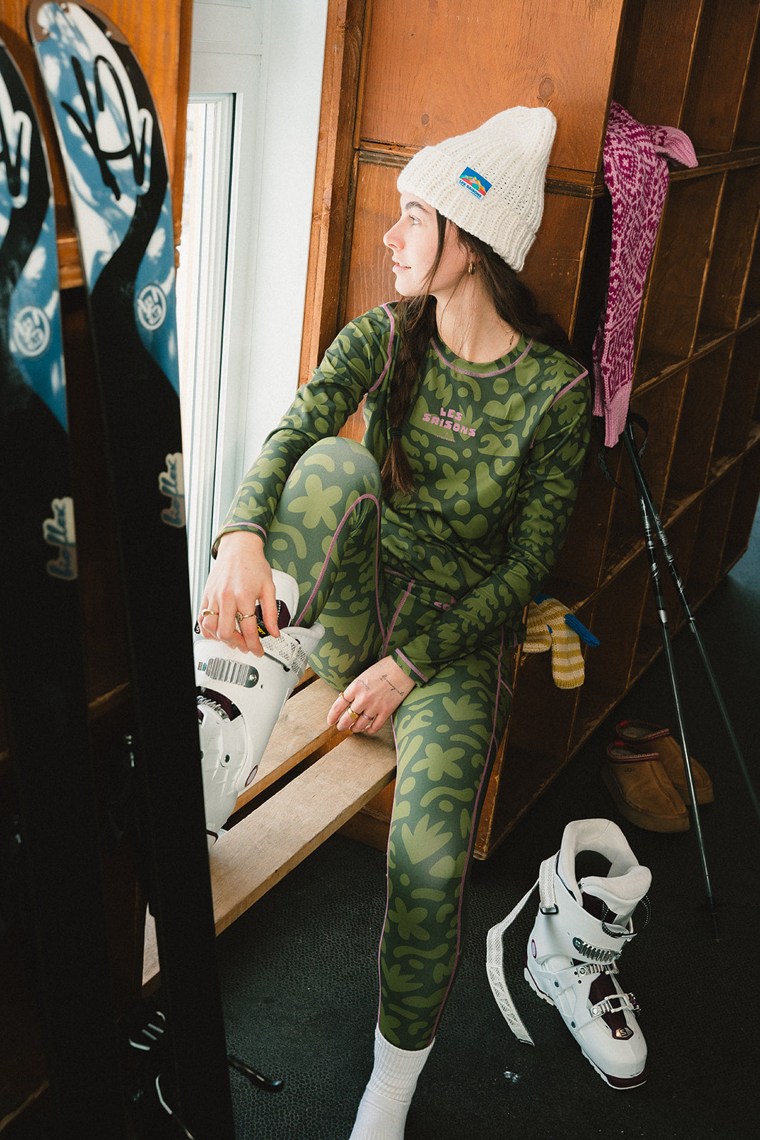 girl wearing Les Saisons and Turbo Bambi underlayer base in a ski shack