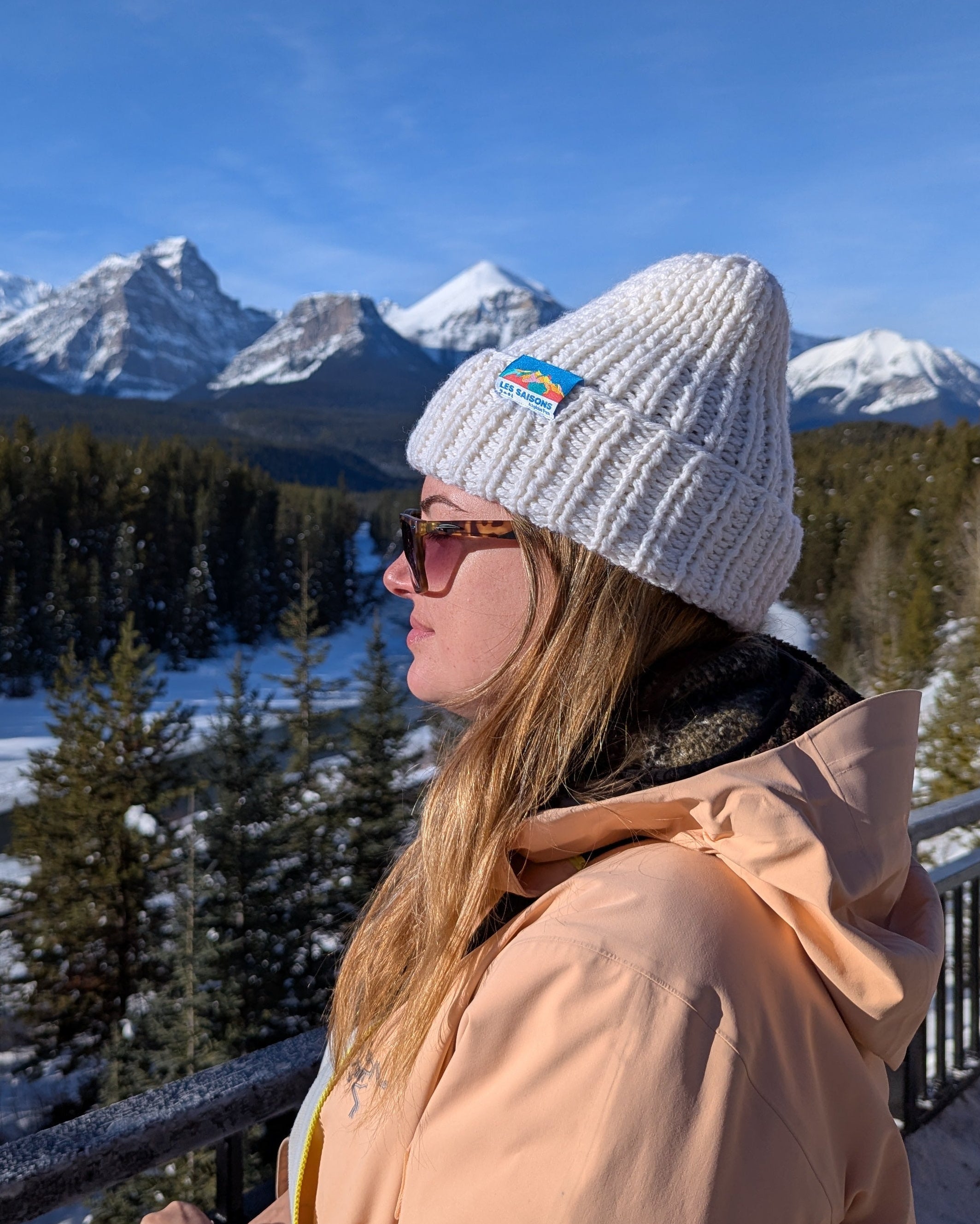 White Merino beanie with a Artwork tag