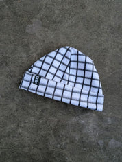 Lightly checkered black and white fleece beanie