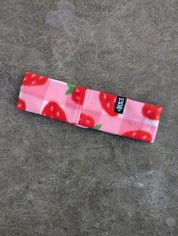 Strawberry patterned, pink and white checkered fleece bandana