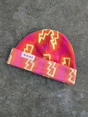 Pink and orange fleece beanie with lightning pattern