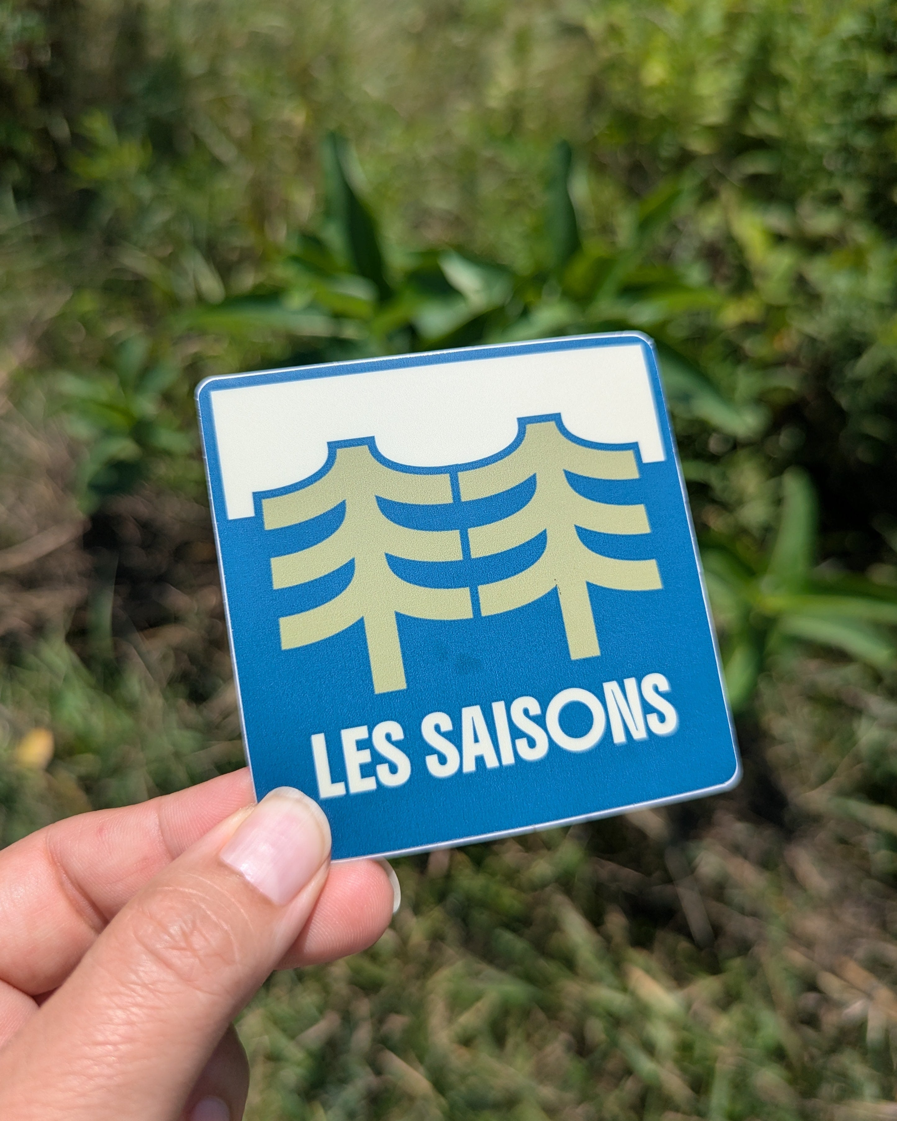 sticker les Saisons outdoorsy with a two trees as illustration